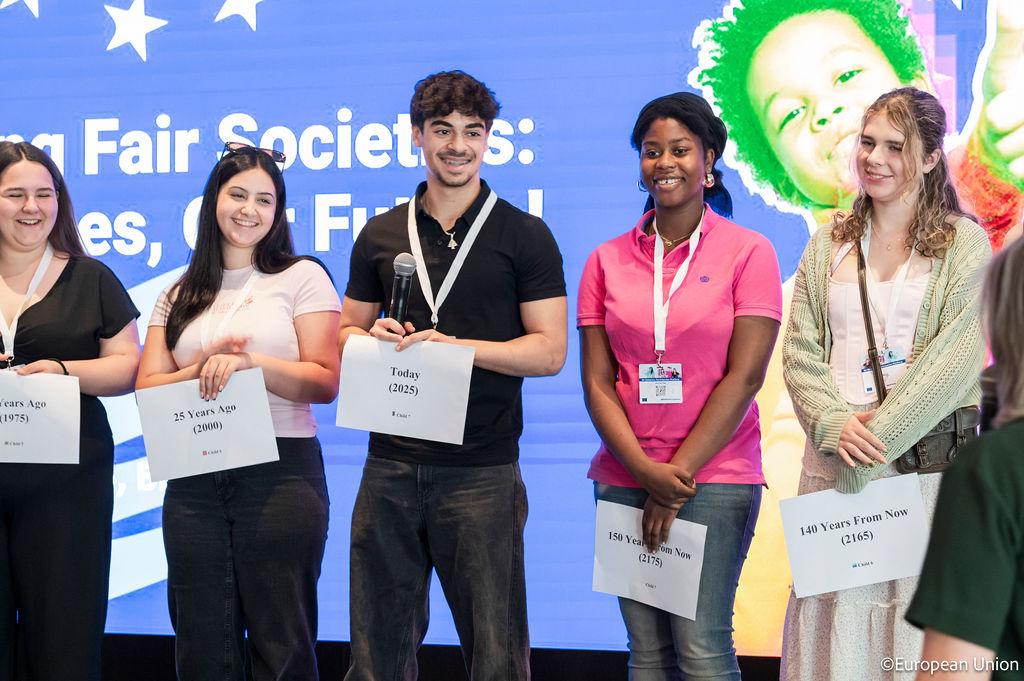 A group of teens in an interactive workshop on intergenerational fairness