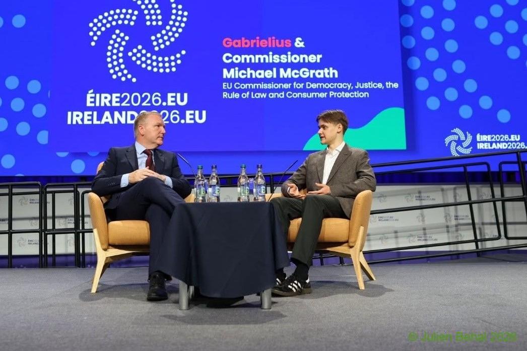 Gabrielius and Commissioner McGrath discussing child participation.